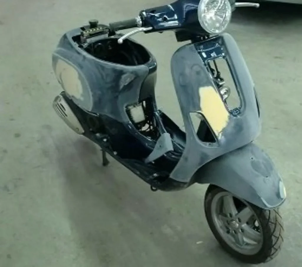 Scooter voor lakreparatie